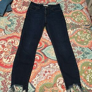 Cello skinny jeans, fringed bottom.